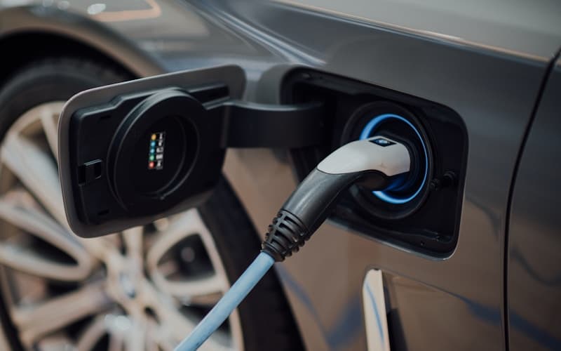 EV charging cable connected to an electric vehicle charge port.
